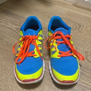 Nike free running shoes bright blue / yellow / orange size 10.5